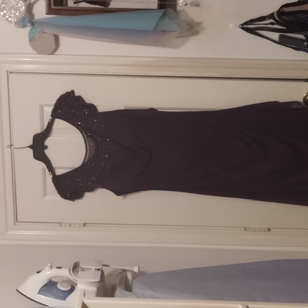 Purple off shoulder evening gown